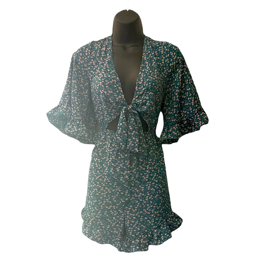 Floral jumpsuit/romper with front tie. Size large. Never worn.